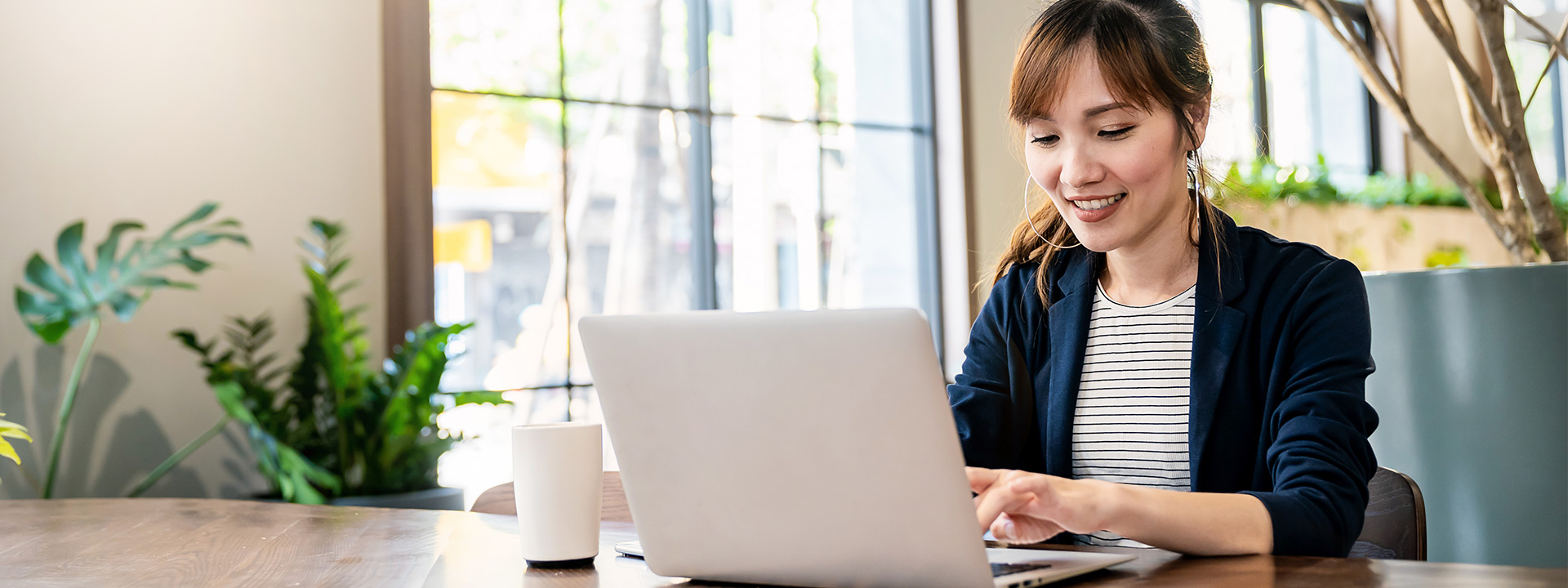 woman working with her laptop