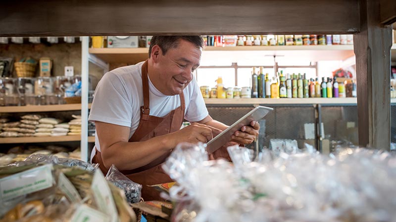 Business owner using a tablet for business